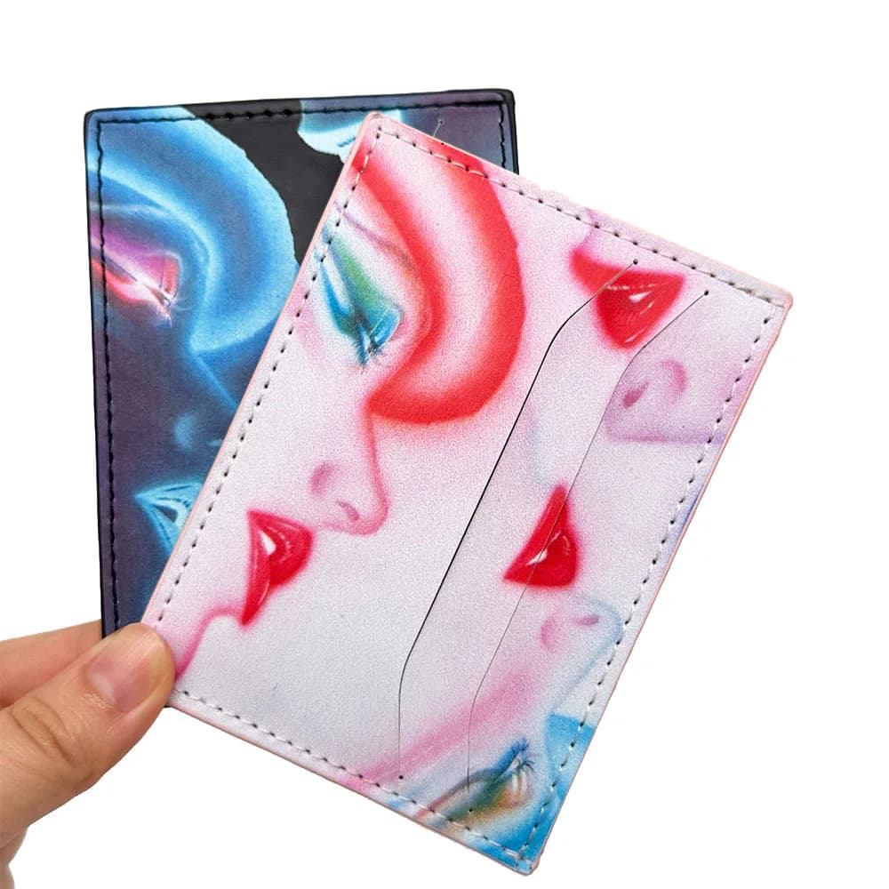 Dark and light printed card holders held together